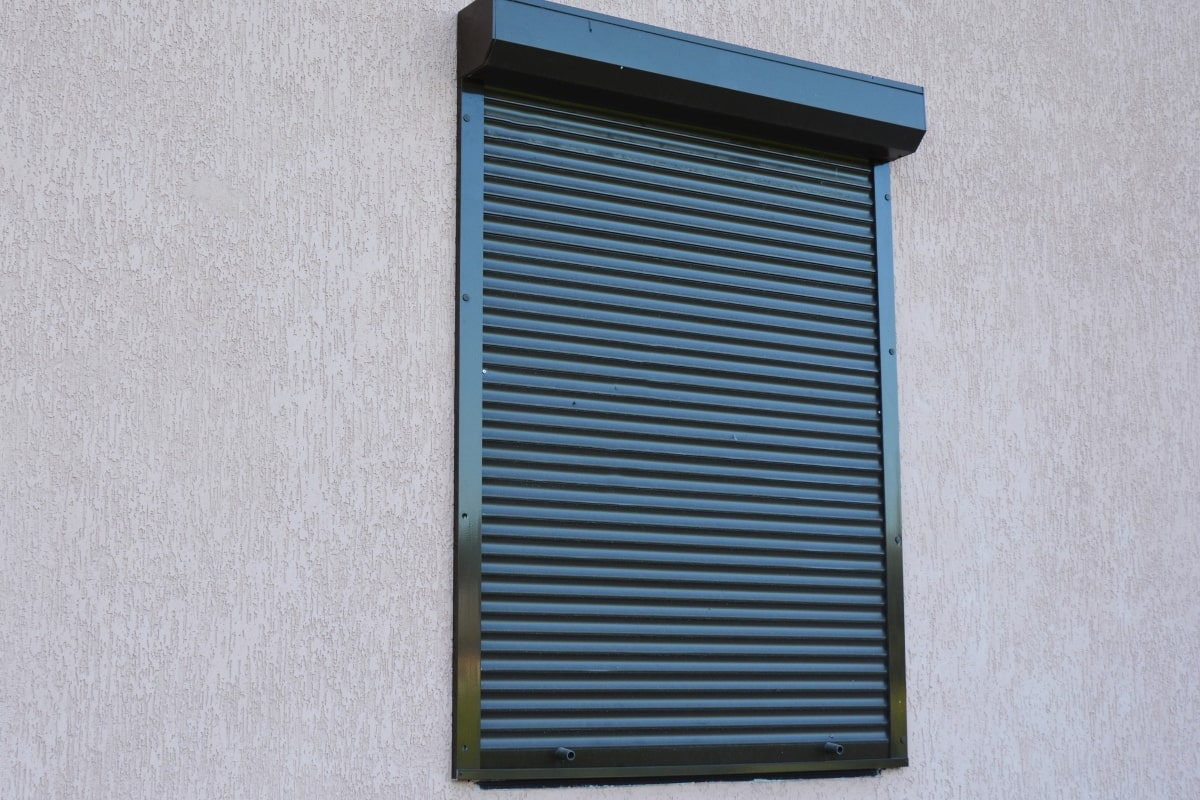 A securely closed roller shutter, illustrating a practical approach to block out noise for homeowners looking for quiet interiors.