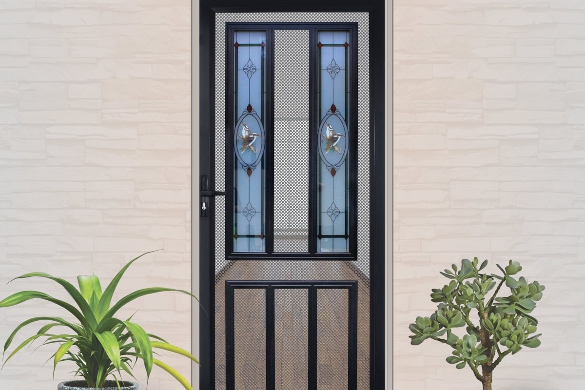 A decorative heritage security screen door, with custom design, stainless steel mesh and aluminium panel.
