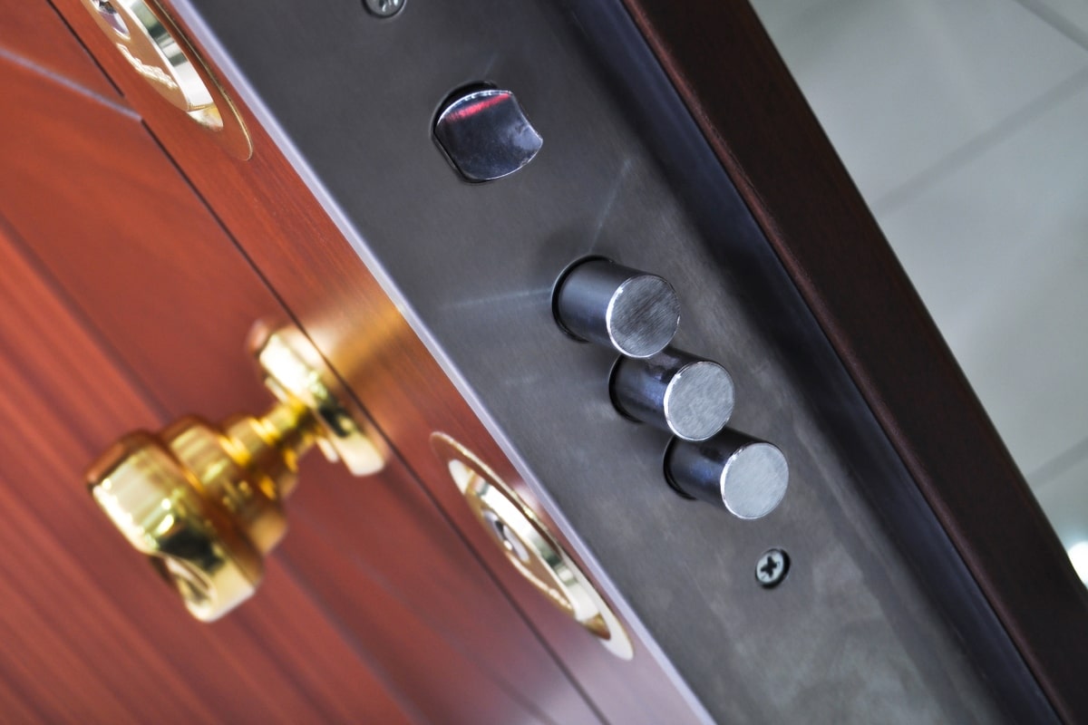 An angled view of a high-security dead bolt lock mechanism, highlighting the customisation options for deadlocks to fit various door styles.