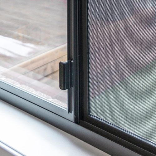 Slightly opened security window screen in Perth home.
