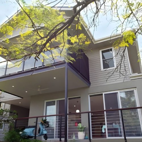 Exterior of a house with security screens.