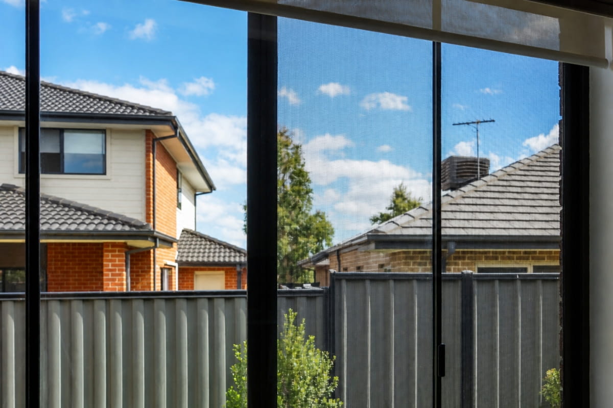Openable home window with a security screen installed to provide ventilation while helping prevent accidental window falls.