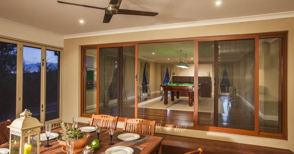 Create a comfortable indoor/outdoor area with bifold security doors.