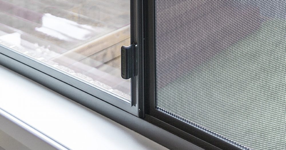 Security window screens installed to prevent damage from cats and dogs.