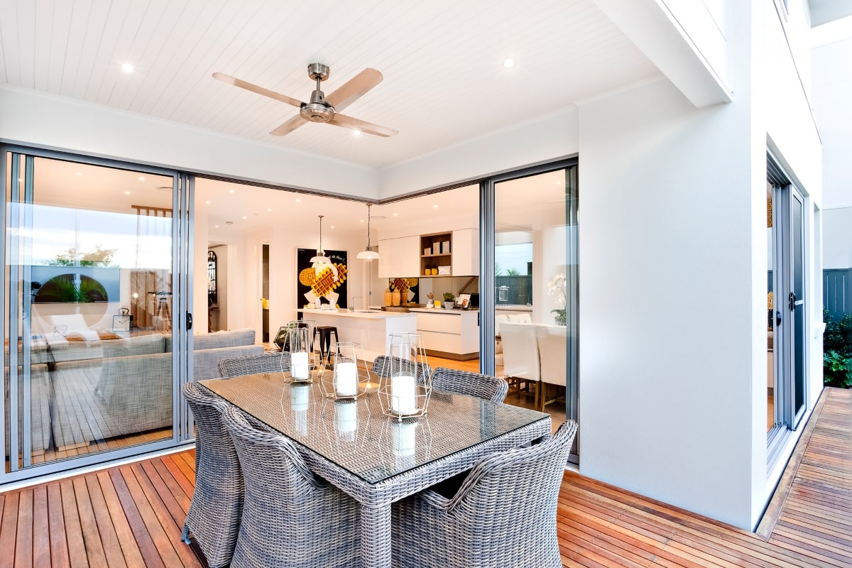 Modern sliding security screen doors offering a seamless transition between the patio and the indoor living space.